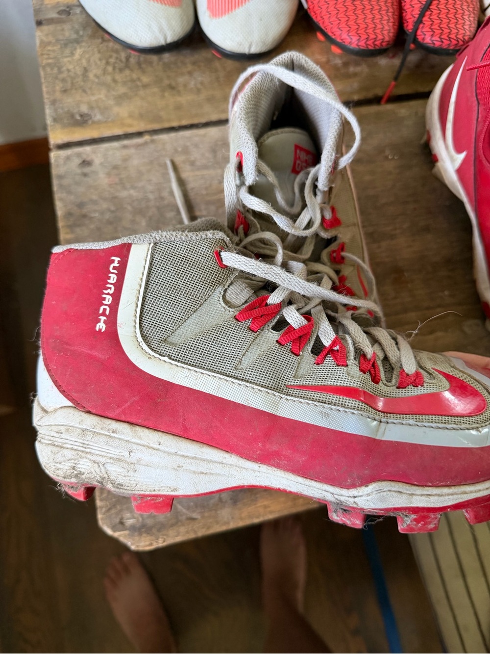 Gray and Red Nike Baseball Cleats